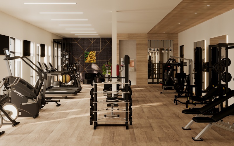 Gym area featuring various fitness equipment for workouts.
