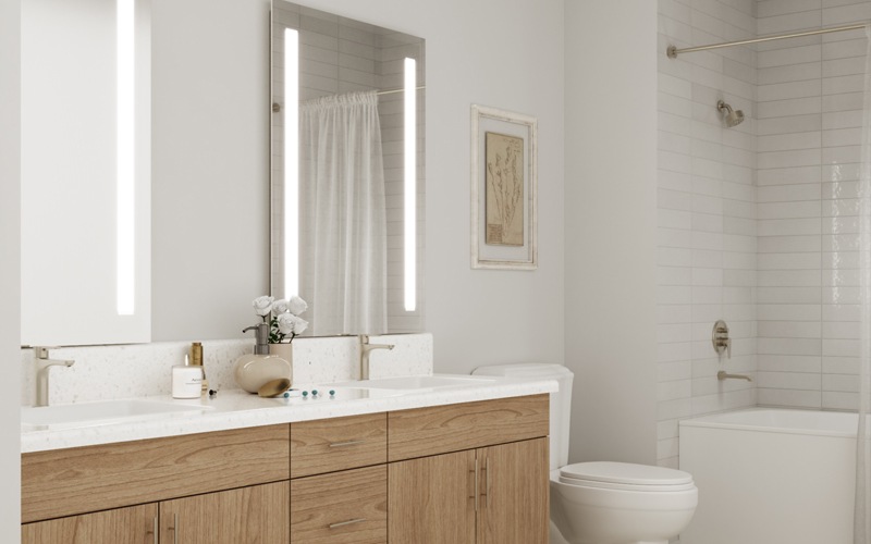 A bathroom with a white tub and a wooden vanity, featuring a sleek and modern design